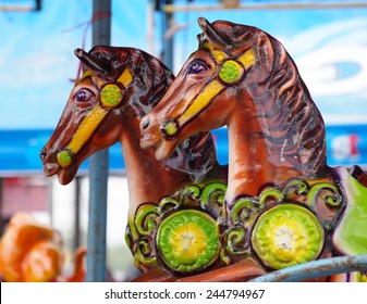 Old Aged Colorful Riding Animals Horses Rabbits Ducks Toys In A Playground As Circus Carousel In A Country Fair In LOY KRATHONG Festival THAILAND. 