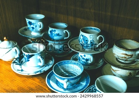 Similar – Tea set on dark background