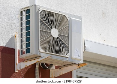 Old Air Conditioning Refrigeration Unit Outside The Building