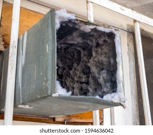 Old air duct filled with dust and dirt