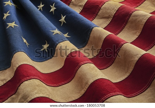 Old American flag designed during the American\
Revolutionary War features 13 stars to represent the original 13\
colonies. According to the legend the original Betsy Ross flag was\
made on July 4, 1776.