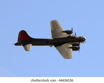 Old American heavy bomber in flight
