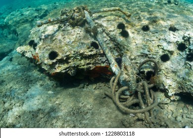 Old Anchor Deep In The Sea. Underwater View