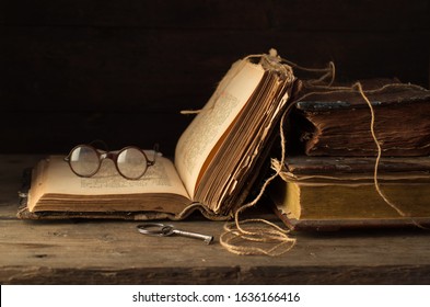 Old antique book on a wooden table - Powered by Shutterstock