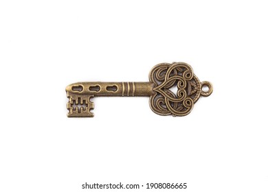 Old antique key on white background