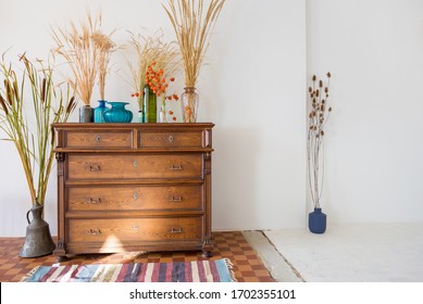 Old Antique Old Mahogany Chest Of Drawers In A Room With Additional Decor