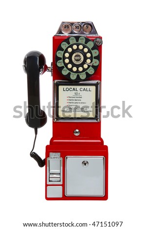 Old, antique, vintage red pay phone isolated over white