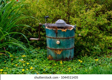 Old Antique Wooden Bucket Used As Ice Cream Maker With Foliage In Background