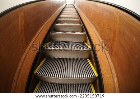 old antique wooden escalator in new york city mall
