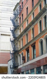 Old Apartment Buildings Exterior With Fire Ladder Outside    