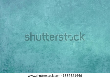 Old aquamarine wall grunge background or texture 