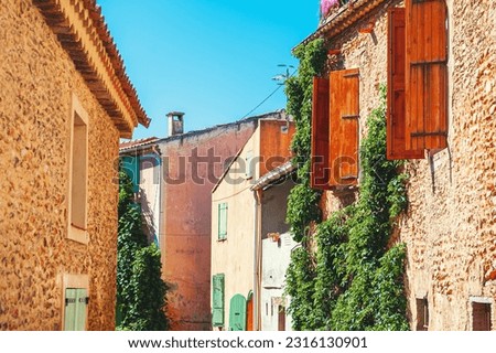 Old architecture on the cozy street in Valensole, Provence, France. Famous tavel destination Stok fotoğraf © 