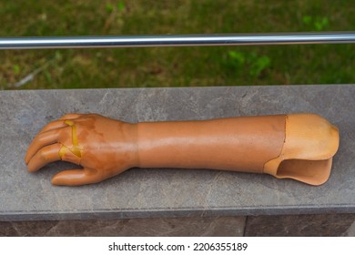 Old Artificial Hand On The Pavement Of The City Of Istanbul. Lost Plastic Limb On The Street. Old Forgotten Prosthetic Hand On The Road