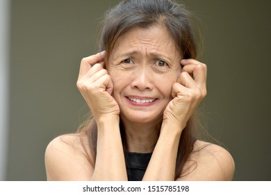 Old Asian Female Senior With Alzheimers