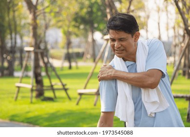 Old Asian People Suffer From Exercise Pain. Senior Man Suffering From Sore Arm.