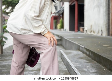 Old Asian Woman Having Knee Joint Pain Or Knee Injury Problem, Concept Of Accessibility Or A11y