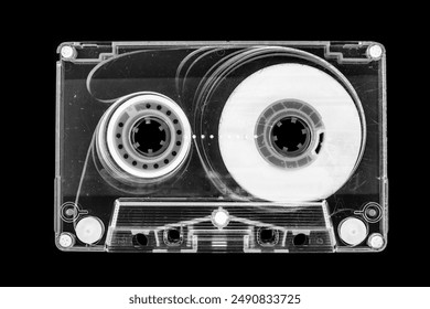 old audio cassette tape on black background - Powered by Shutterstock