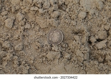 Old austrian silver coin on the ground