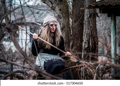 Old Baba Yaga With A Broom