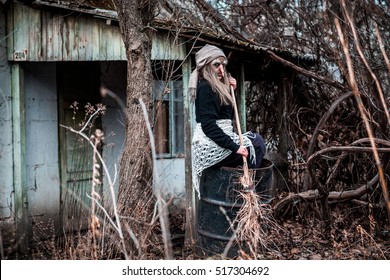 Old Baba Yaga With A Broom