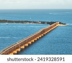 The old Bahia Honda Railroad Bridge with the new Bahia Honda Bridge on the background, Florida Keys, USA.