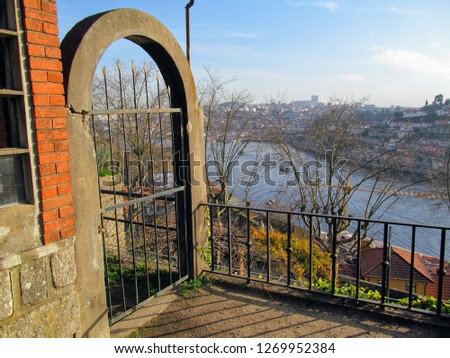 Old balcony overlooking the river and city