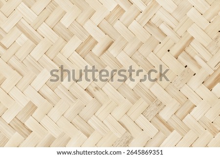 Old bamboo weaving pattern, woven rattan mat texture for background and design art work.