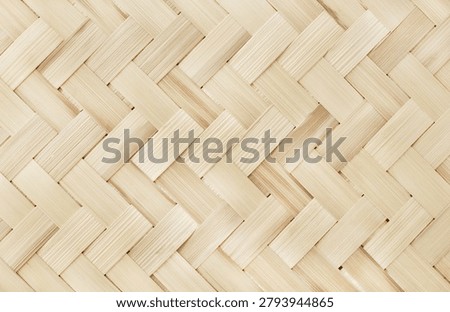 Old bamboo weaving pattern, woven rattan mat texture for background and design art work.