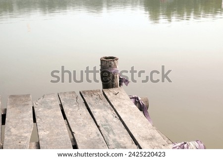 Old bamboo and wood made fishing platform. fishing lake of Bangladesh.
