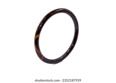 old bangle bracelet has brown wooden pattern isolated on white background,vintage and retro,macro  photo,has path
