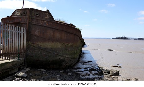 old barge rusting on the banks of the Humber Estuary, East Riding of Yorkshire, England - Shutterstock ID 1126190330