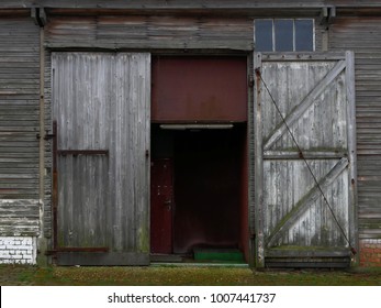 Old Barn With Half Open Door