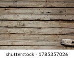 An old barn from logs. An outer wall. Can be used for background or wallpaper.