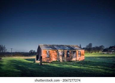 Old barn in moonlight, English countryside in winter with starry night sky, Buckinghamshire, UK - Powered by Shutterstock