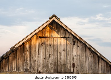 The Old Barn Roof Against The Sky