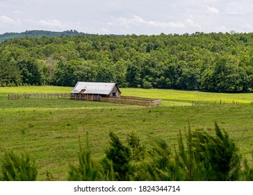 Old Barn Sitting in Rural Pasture