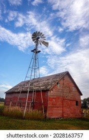 An Old Barn And Windmill On A South Dakota Farm.