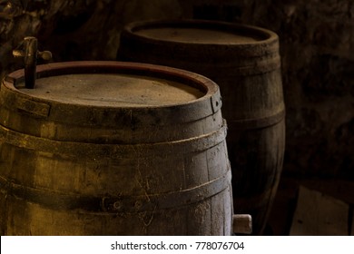 Old Barrels In A Cellar Room