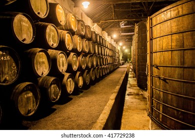 Old Barrels in the wine cellar, Porto, Portugal