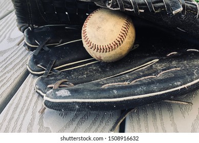 An Old Baseball and an Old Glove.