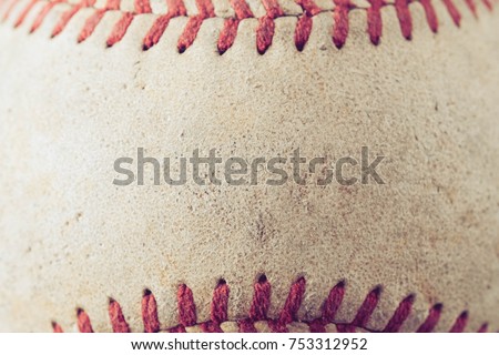old Baseball on wood background with filter effect retro vintage style