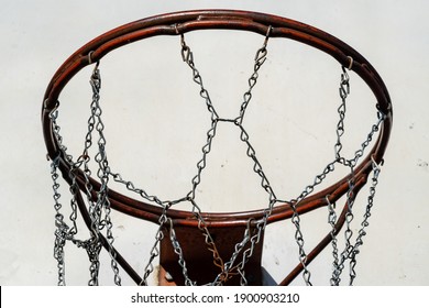 Old basketball hoop with a metal net - Powered by Shutterstock