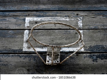 Old basketball hoop outside close-up 