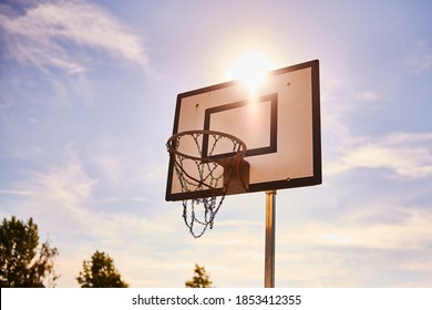 A Old Basketball Net In The Sun