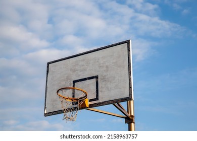 Old Basketball Shield And Basketball Hoop, Old Sports Equipment In The Old Sleeping Area Of The City