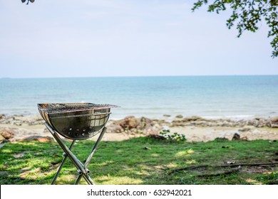 Old Bbq Roster On The Beach 