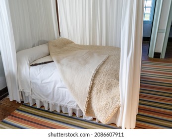 Old bed with the covers pulled back