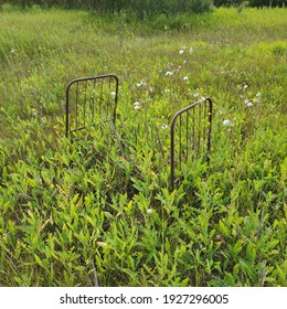 Old Bed Frame In Abandoned Town