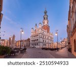 The old bell tower with the clock of the town hall during blue hour in Poznan