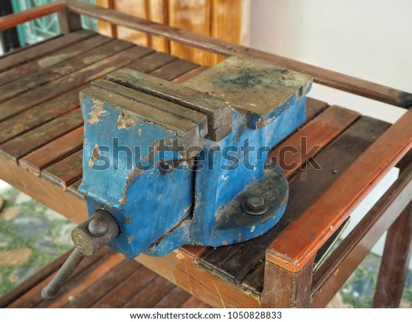 Old Bench Vise On Wood Table Technology Industrial Stock Image